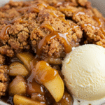 Caramel Apple Dump Cake served warm with vanilla ice cream