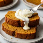 Vanilla Pudding Pumpkin Bread slices served with maple butter